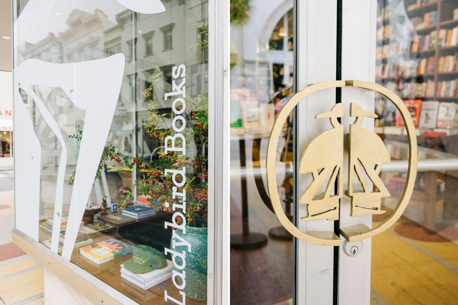 A detail of an exterior of a bookshop, including a ladybug like woman on brass handles