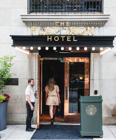 A woman walks into a hotel door