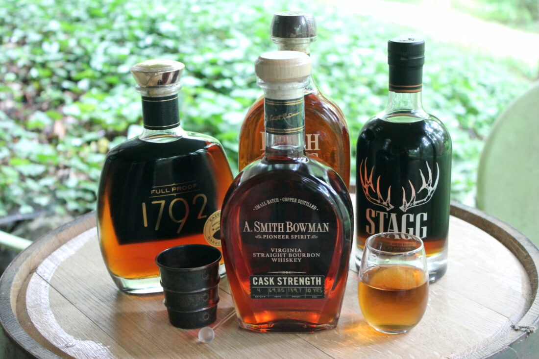 Bottles of bourbon on a cask