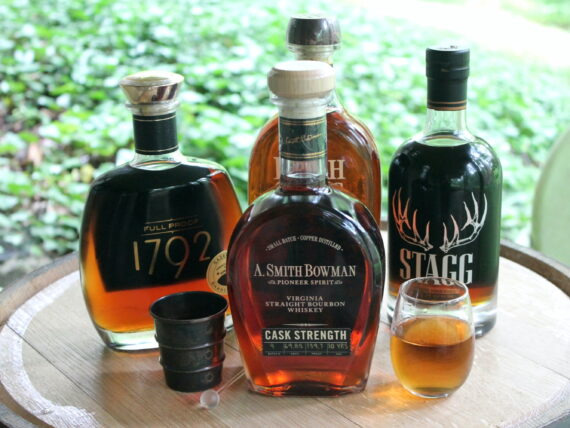 Bottles of bourbon on a cask